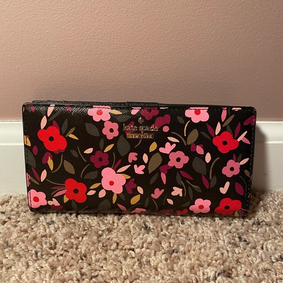 kate spade Handbags - Kate Spade Black Floral Slim Bifold Wallet